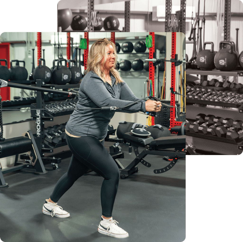 woman pulling weight machine